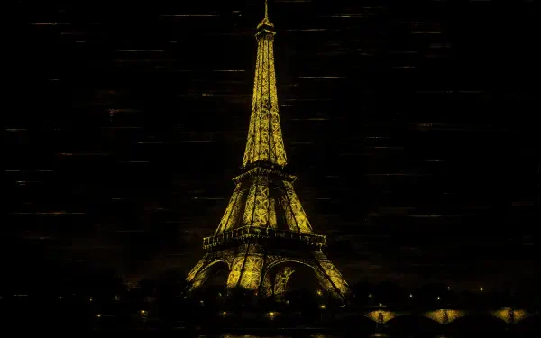 4K Ultra HD desktop wallpaper featuring the illuminated Eiffel Tower glowing against a dark night sky.