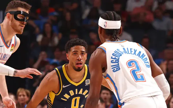 Tyrese Haliburton of the Indiana Pacers in action during an NBA Finals basketball game, captured in an HD PC desktop wallpaper background.
