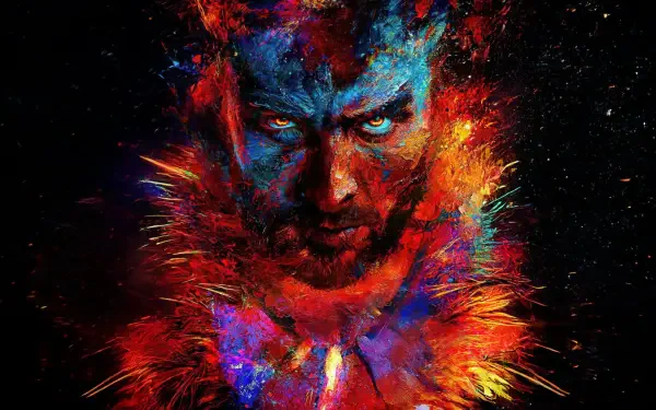 Vivid 4K Ultra HD PC wallpaper featuring a fierce, colorful portrait of Kraven the Hunter from the 2024 film, blending bold reds, blues, and fiery orange hues.