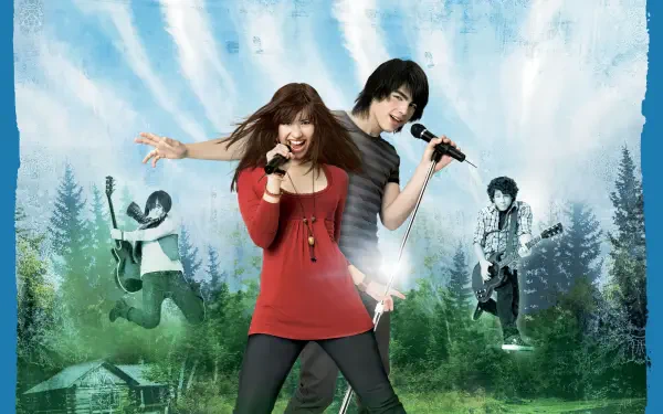 HD PC desktop wallpaper of Camp Rock: two young singers with microphones center stage, sunlight rays over a forest camp and band members playing in the misty background.