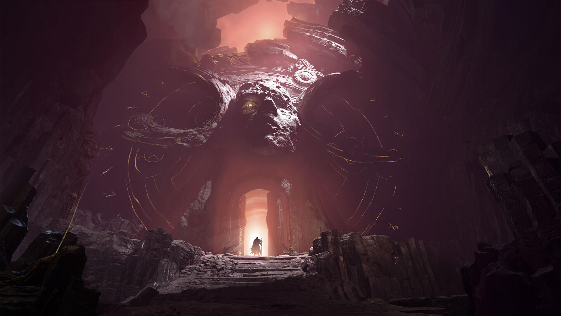 HD PC desktop wallpaper and background — Mistfall Hunter video game scene: a lone hunter silhouette faces a colossal horned skull portal inside a misty cavern, lit by eerie orange light.