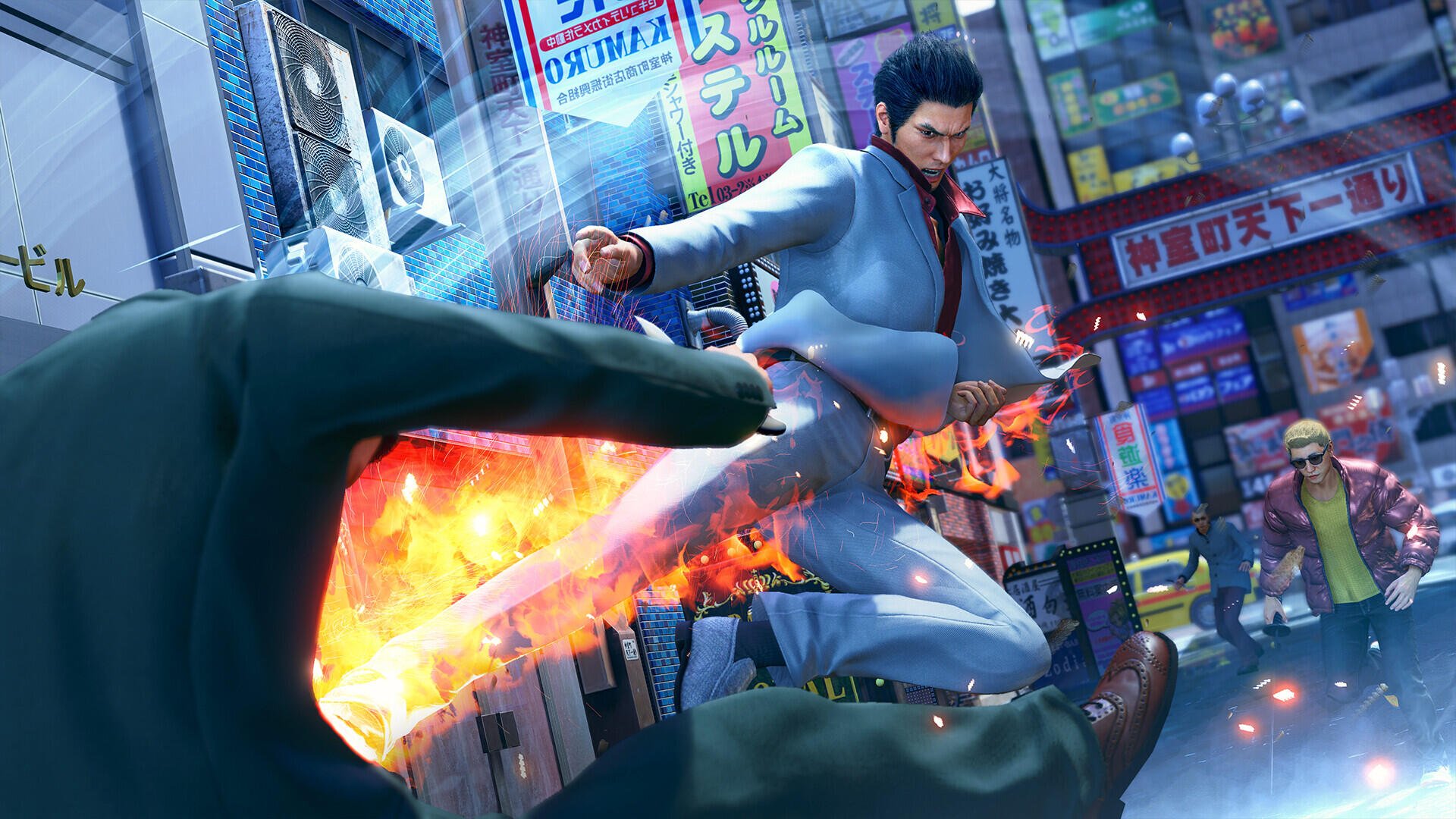 HD PC desktop wallpaper of video game Yakuza Kiwami 3 & Dark Ties: suited protagonist unleashes a flaming flying kick amid a neon-lit city street brawl.