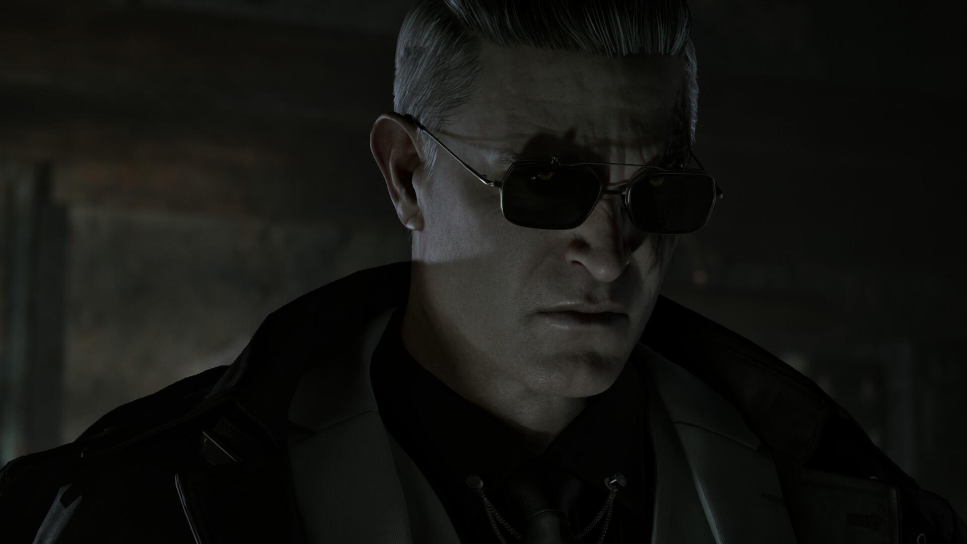 HD PC desktop wallpaper of Albert Wesker from the Resident Evil Requiem video game: brooding close-up, sunglasses, dark coat and shadowed lighting.