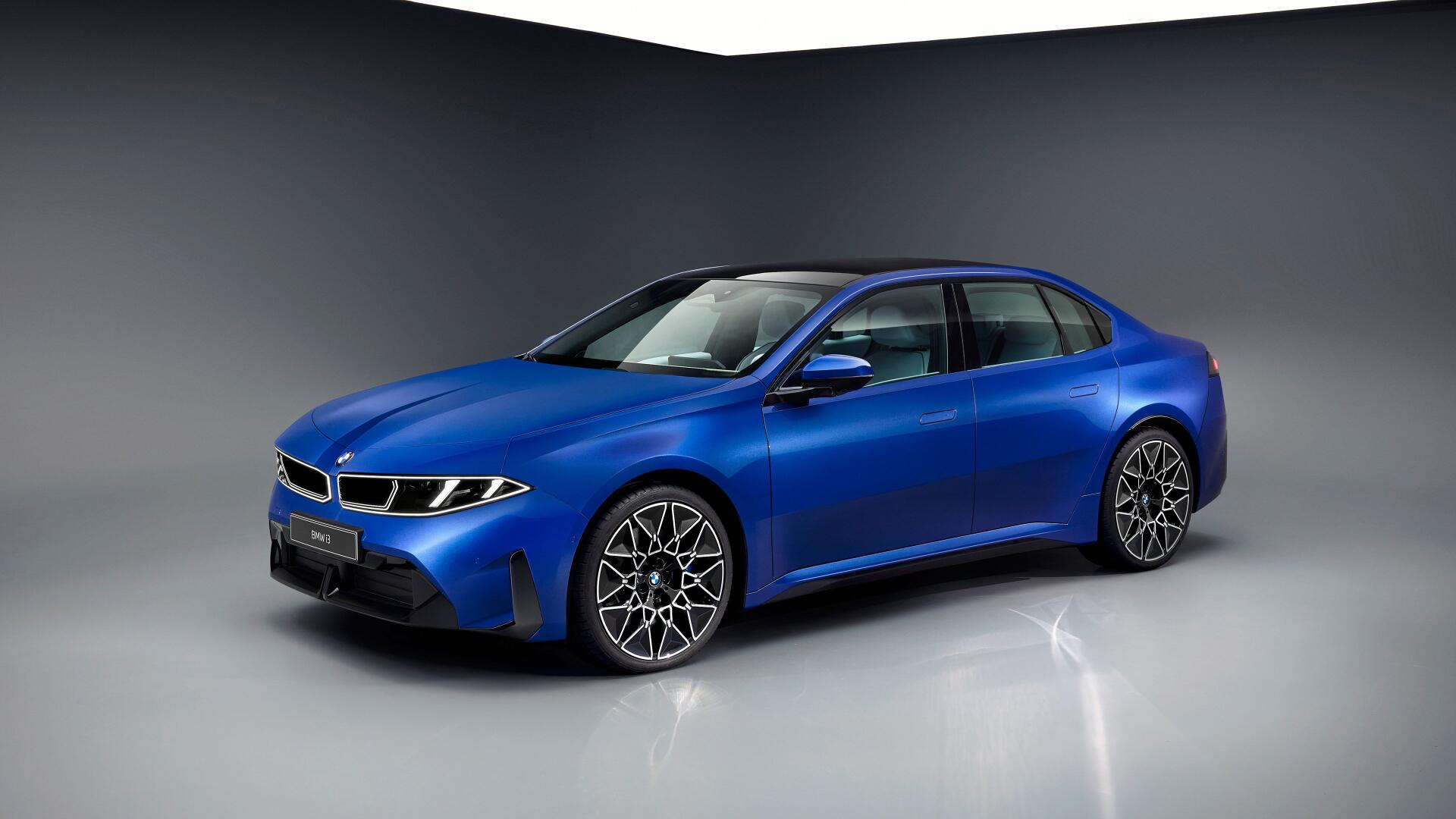 Blue BMW i3 electric vehicle photographed in a studio, shown centered on a glossy floor — 4K Ultra HD PC desktop wallpaper/background.