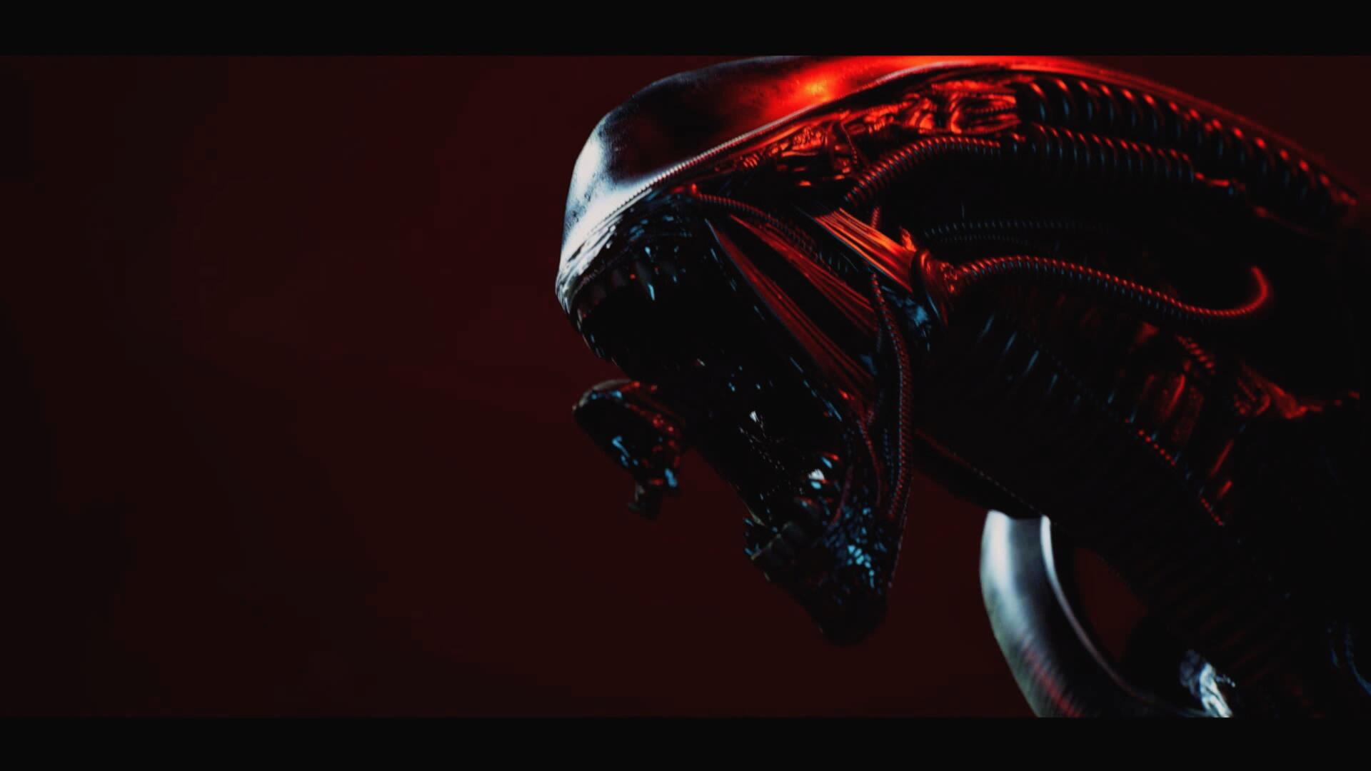Close-up of a glossy biomechanical alien head in red light from a video game — 4K Ultra HD PC desktop wallpaper/background.