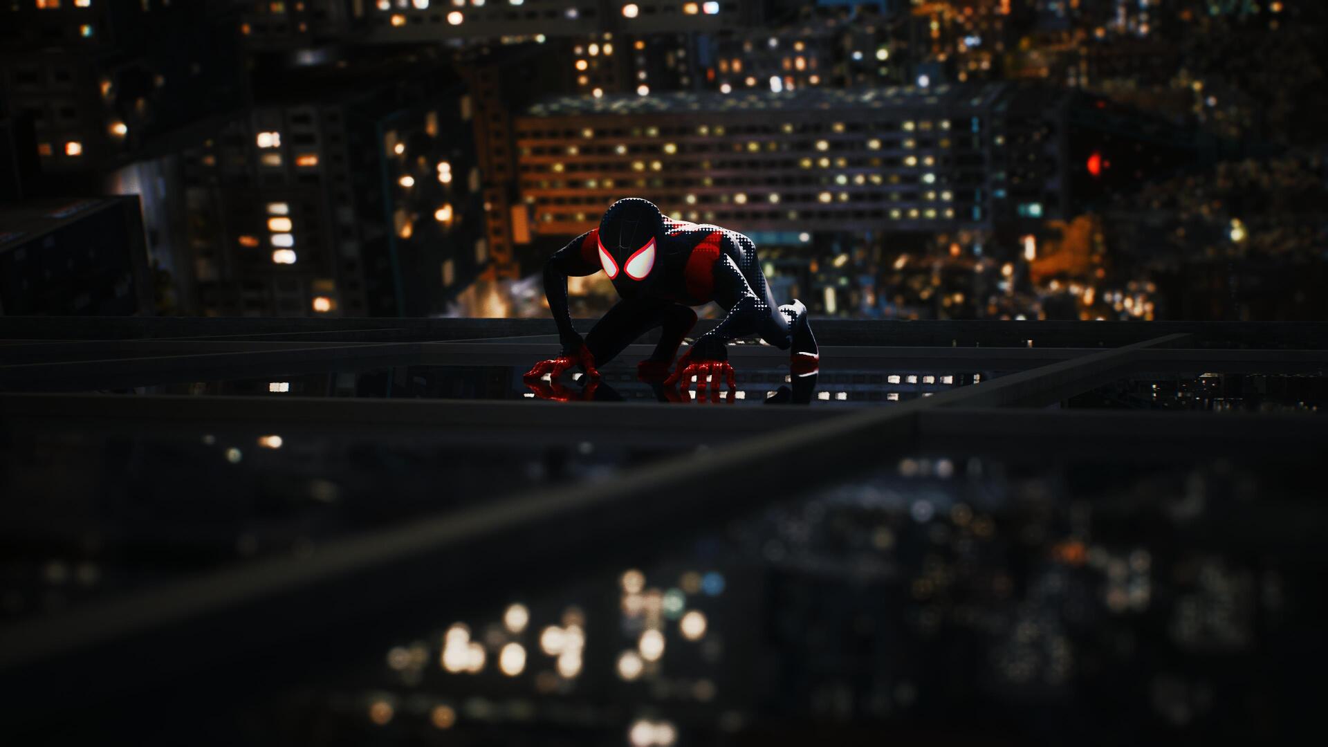 Marvel's Spider-Man 2 4K Ultra HD PC desktop wallpaper: Spider-Man in black-and-red suit crouches on a rooftop beam at night, city lights blurred below.