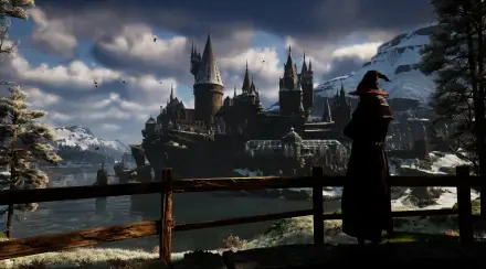 HD PC desktop wallpaper of Hogwarts Castle from the video game Hogwarts Legacy at dusk, a cloaked figure on a railing overlooks the snowy lakeside gaming environment.