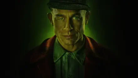 Sinister green-lit portrait from Monster: The Ed Gein Story — 4K Ultra HD PC desktop wallpaper and background.