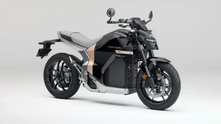 Side view of a Honda WN7 Electric motorcycle on a neutral background — sleek black and silver EV streetbike, 5K Ultra HD PC desktop wallpaper and background.
