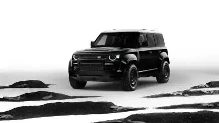 Black Land Rover Defender vehicle on an abstract white landscape with black sand patches; 8K Ultra HD PC desktop wallpaper and background.