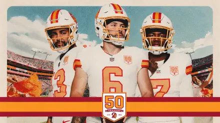4K wallpaper of three NFL players in white Tampa Bay Buccaneers uniforms, a No. 6 quarterback centered, stadium backdrop and a 50th season ribbon across the foreground.