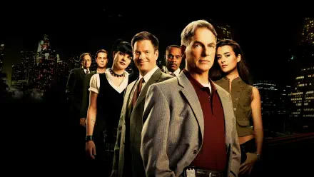 NCIS ensemble portrait against a nighttime city skyline — 4K Ultra HD PC desktop wallpaper/background.