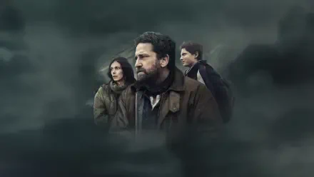 Greenland 2: Migration — three people emerge from dark, stormy mist with tense expressions; cinematic 4K Ultra HD PC desktop wallpaper and background.