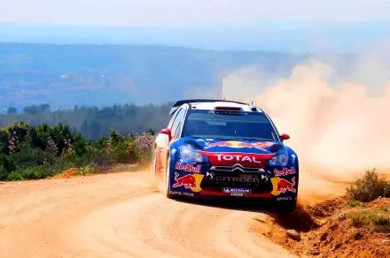 2K Quad HD PC desktop background: Citroën DS3 WRC race car tearing down a dusty dirt stage, WRC livery and sponsor logos visible.