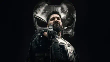 The Punisher: One Last Kill — brooding vigilante in tactical gear points a gun beneath a giant skull emblem, 4K Ultra HD PC desktop wallpaper and background.