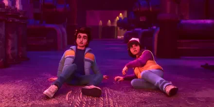 Stranger Things: Tales from '85 2K Quad HD PC desktop wallpaper: two teens in 80s jackets sit on a purple-lit factory floor, staring upward with shocked expressions.