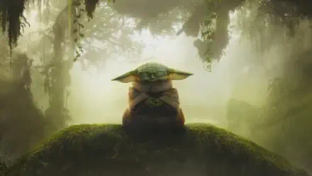 4K Ultra HD PC desktop wallpaper: Grogu from The Mandalorian sits on a mossy mound in a misty, sunlit forest background.