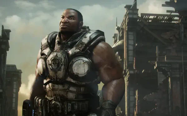 HD PC desktop wallpaper and background from the video game Gears Of War: Reloaded — a heavily armored soldier stands amid a ruined industrial skyline.