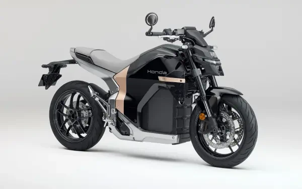 Side view of a Honda WN7 Electric motorcycle on a neutral background — sleek black and silver EV streetbike, 5K Ultra HD PC desktop wallpaper and background.