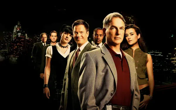 NCIS ensemble portrait against a nighttime city skyline — 4K Ultra HD PC desktop wallpaper/background.