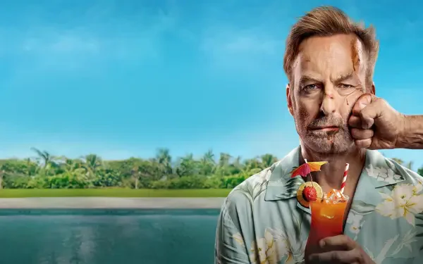 Nobody 2 4K Ultra HD PC desktop wallpaper: bruised man in a Hawaiian shirt sips a cocktail with an umbrella as a fist presses his cheek, tropical beach and blue sky behind him.