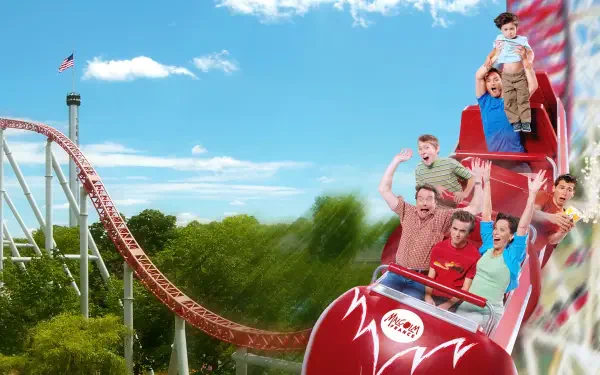 Malcolm in the Middle 4K Ultra HD PC desktop wallpaper: the show's family screaming on a red roller coaster against a bright blue sky and green treeline.