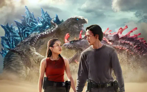 Monarch: Legacy of Monsters 4K Ultra HD PC desktop wallpaper: two agents stand before towering kaiju with glowing dorsal fins under a stormy sky.