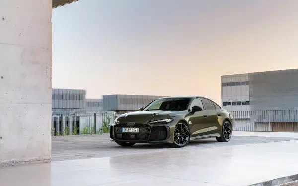 Dark Audi RS5 vehicle parked in a minimalist concrete urban setting, presented as a 2K Quad HD PC desktop wallpaper/background.