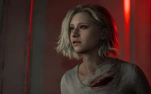 Grace Ashcroft from Resident Evil Requiem (Capcom), bloodstained and bathed in red light — 5K Ultra HD PC desktop wallpaper/background, horror video game scene.