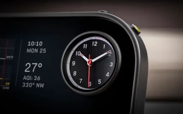 Close-up of a Ferrari Luce vehicle dashboard clock and digital readouts, rendered as a 4K Ultra HD PC desktop wallpaper and background.