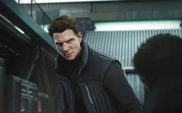 HD PC desktop wallpaper from the video game 007: First Light — brooding James Bond in a dark jacket, tense expression as he leans forward in an industrial, dimly lit interior.