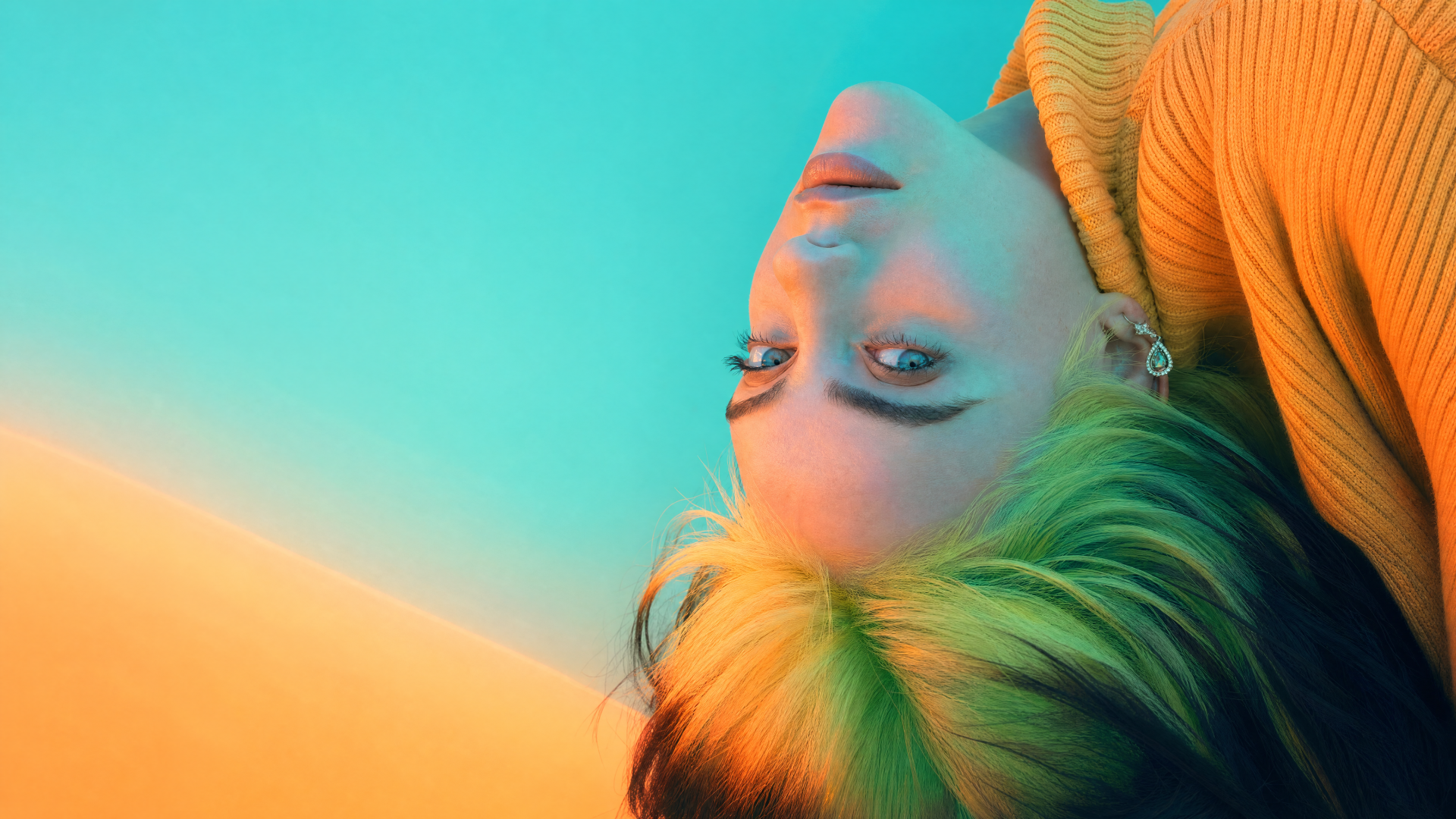 Upside-down portrait of a young woman with neon green-and-black hair against a teal-to-peach gradient — 4K Ultra HD PC desktop wallpaper.