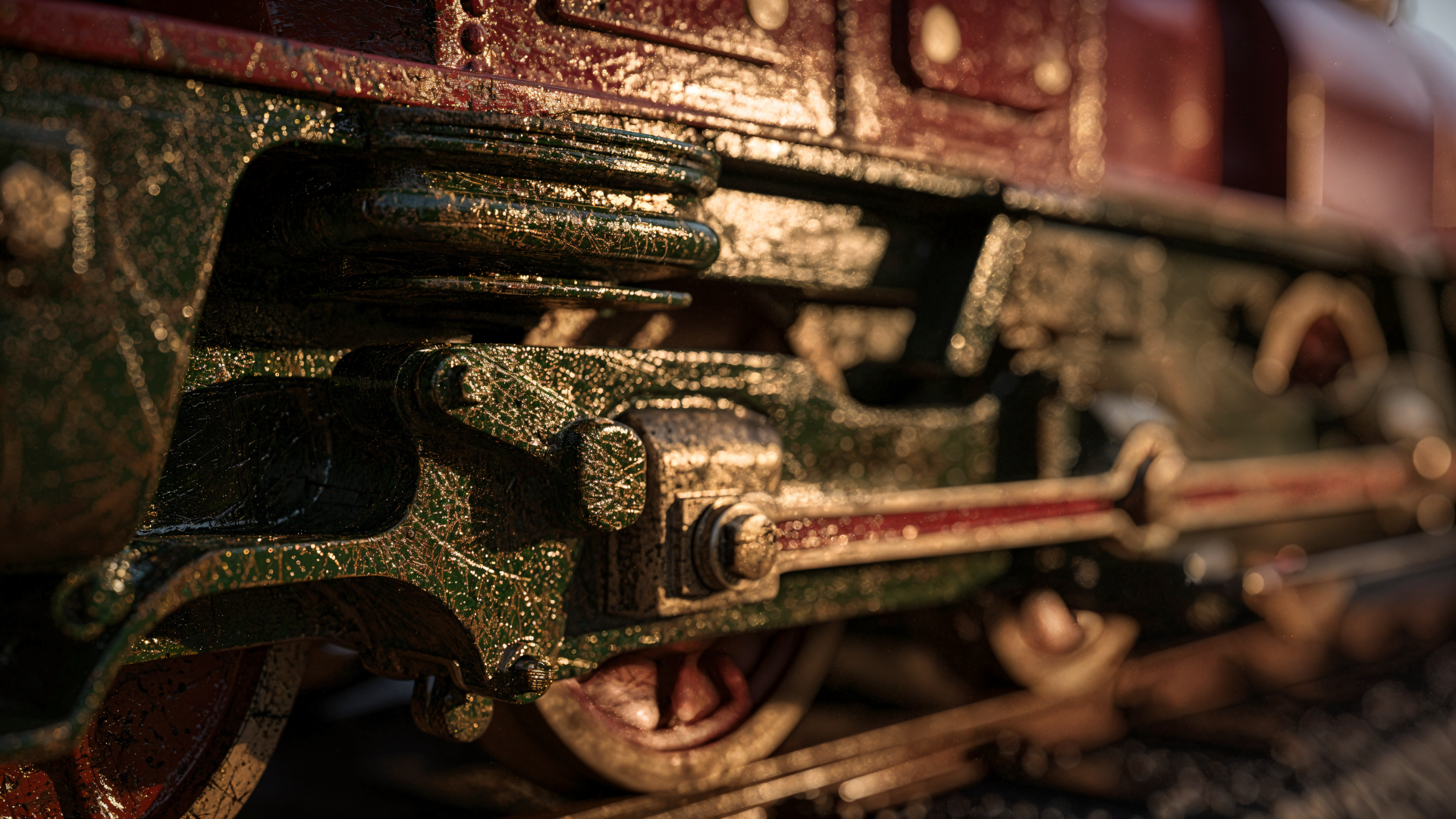 Close-up of a weathered green locomotive's wheel and connecting rods, textured metal detail — 4K Ultra HD PC desktop wallpaper and background.