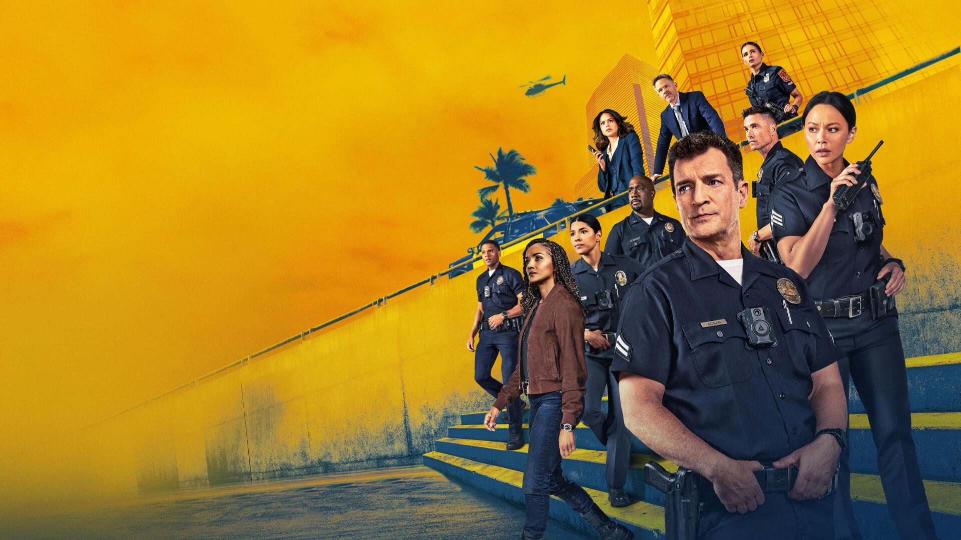 4K Ultra HD PC desktop wallpaper of The Rookie: the show's officers posed on steps against a vivid yellow-orange skyline.