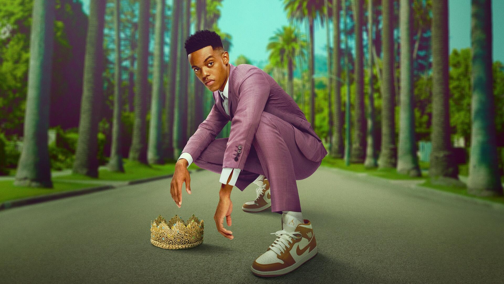 Bel-Air 4K Ultra HD PC desktop wallpaper: man in purple suit crouching on a palm-lined boulevard, crown on the pavement beneath a vivid teal sky.