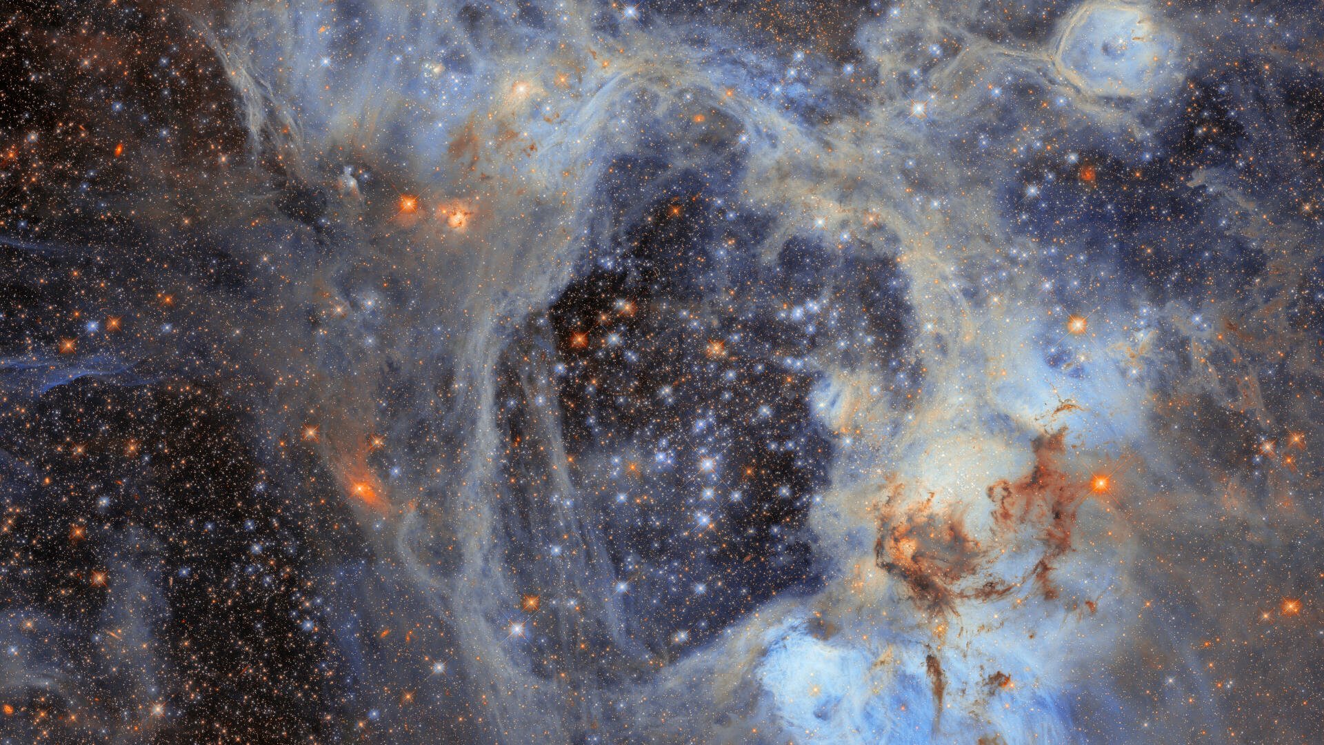 4K Ultra HD PC desktop wallpaper from the Hubble Space Telescope showing a colorful nebula and dense starfield in deep space.