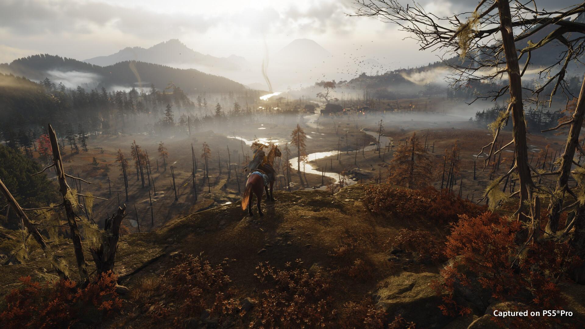 Ghost of Yōtei 4K Ultra HD PC desktop wallpaper: a fog-wreathed forested valley with a winding river, distant mountains, and a lone rider overlooking the misty landscape.