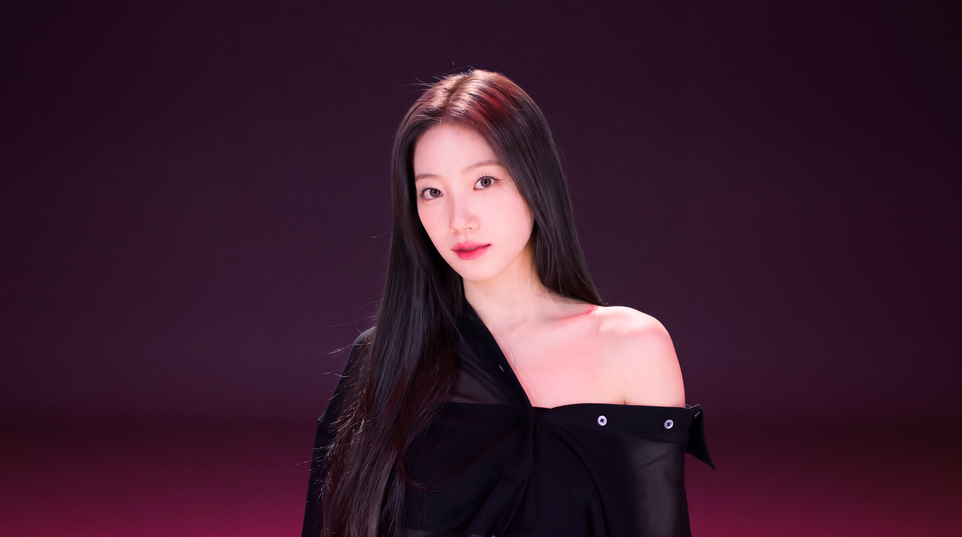 5K Ultra HD PC wallpaper: portrait of a long black-haired woman in an off-shoulder black top, soft lighting and magenta backdrop, K-pop–inspired styling.