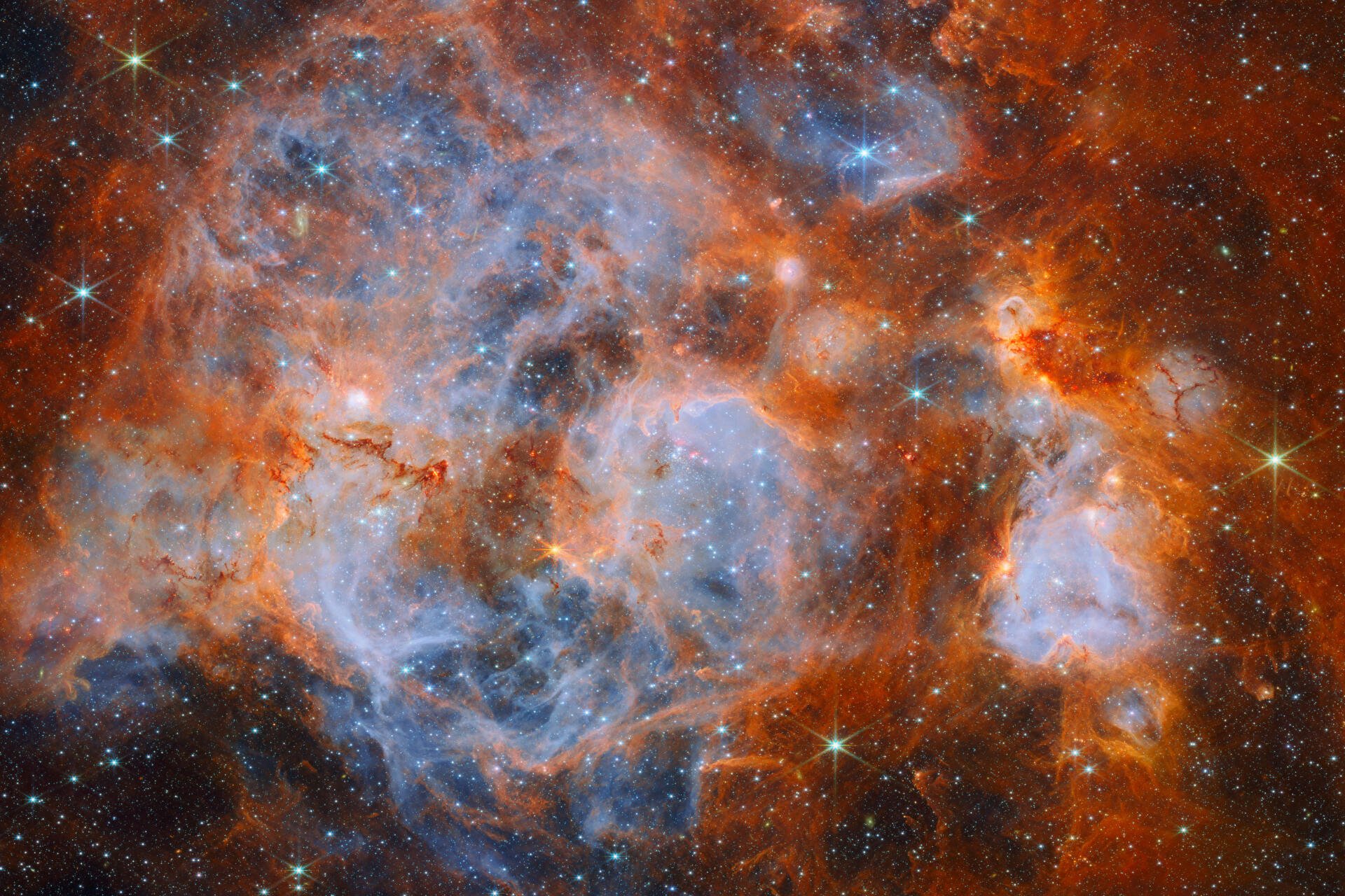 James Webb Space Telescope view of a glowing Large Magellanic Cloud nebula, 8K Ultra HD desktop wallpaper background.