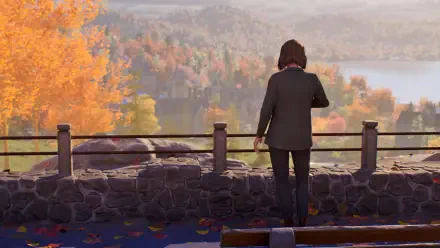 4K Ultra HD PC desktop wallpaper from the video game Life Is Strange: Reunion — a character stands on a stone overlook, watching autumn foliage and a distant lake, a suitcase and bench nearby.
