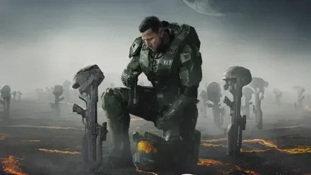 Master Chief kneels on a scorched alien shore amid helmets and rifles under a pale moon — 4K Ultra HD Halo (TV show) PC desktop wallpaper.