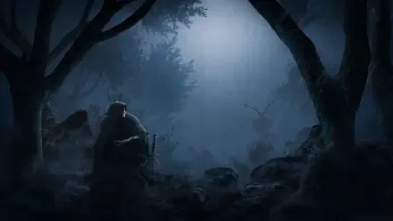 The Witcher 4K Ultra HD PC desktop wallpaper: a moonlit, mist-shrouded forest where a cloaked witcher sits by a sword beneath gnarled trees.