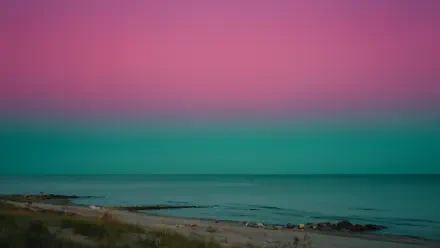 End-of-summer seascape: tranquil ocean meeting a teal-to-pink gradient sky — 4K Ultra HD PC desktop wallpaper and background.