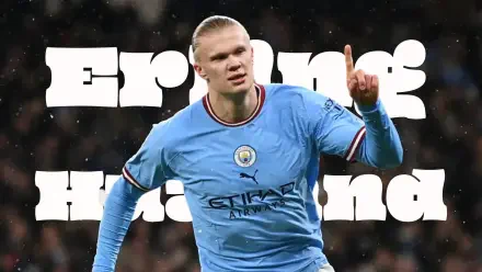HD desktop wallpaper of a Manchester City F.C. forward in sky-blue kit celebrating with finger raised, bold white name-style text behind him.