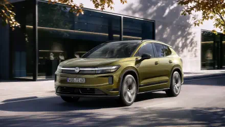 Olive Volkswagen ID. Tiguan SUV parked on a city street, 4K Ultra HD PC desktop wallpaper and background.