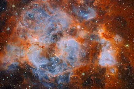 James Webb Space Telescope view of a glowing Large Magellanic Cloud nebula, 8K Ultra HD desktop wallpaper background.