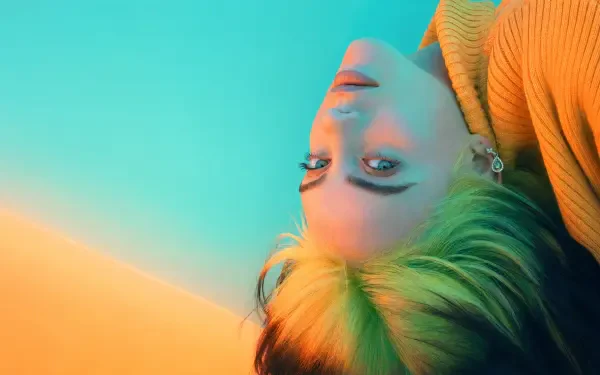 Upside-down portrait of a young woman with neon green-and-black hair against a teal-to-peach gradient — 4K Ultra HD PC desktop wallpaper.