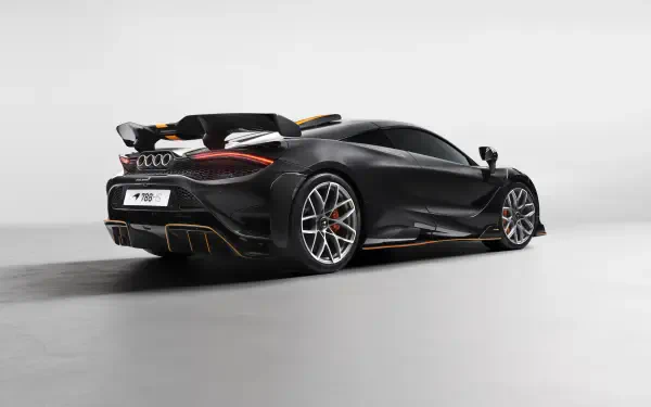 Matte black McLaren 788HS sports car, rear three-quarter view on a minimalist gray studio backdrop — 8K Ultra HD PC desktop wallpaper and background.