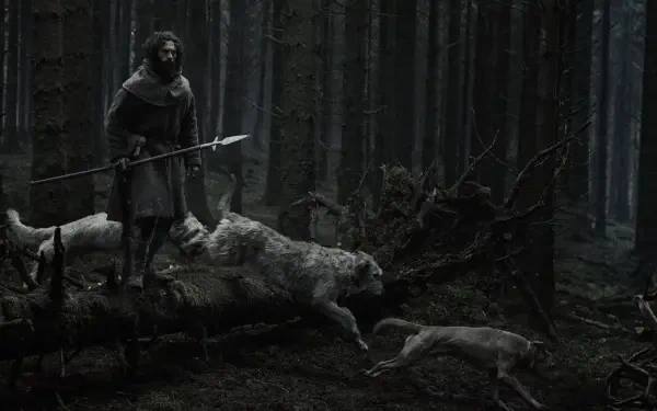 4K Ultra HD PC desktop wallpaper and background: a cloaked figure with a spear in a moonlit, shadowed forest as wolves surround a snarling werewolf crossing a fallen log.
