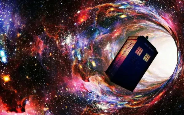 Doctor Who (2005) 4K Ultra HD PC desktop wallpaper: the blue TARDIS spiraling through a vivid, multicolored cosmic vortex of stars.